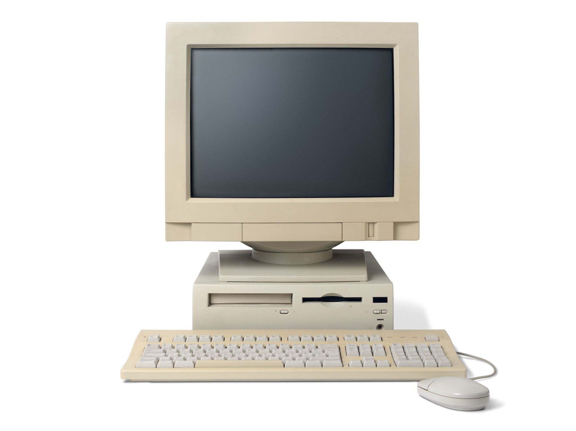 Old, white, desktop PC computer with a keyboard and mouse